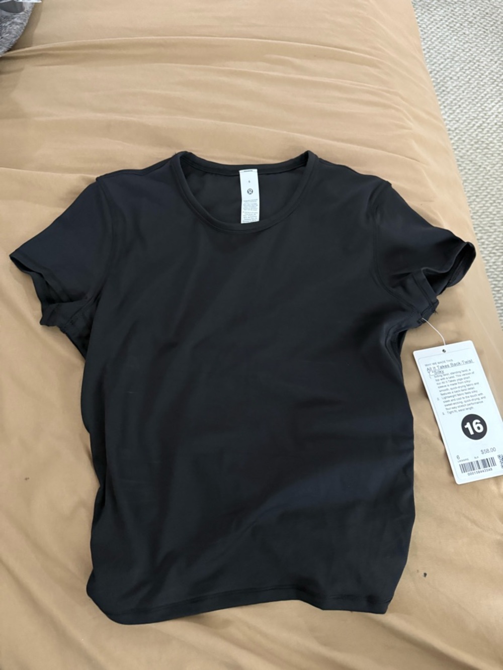 Lululemon All it takes back twist T silky nwt size 6 black